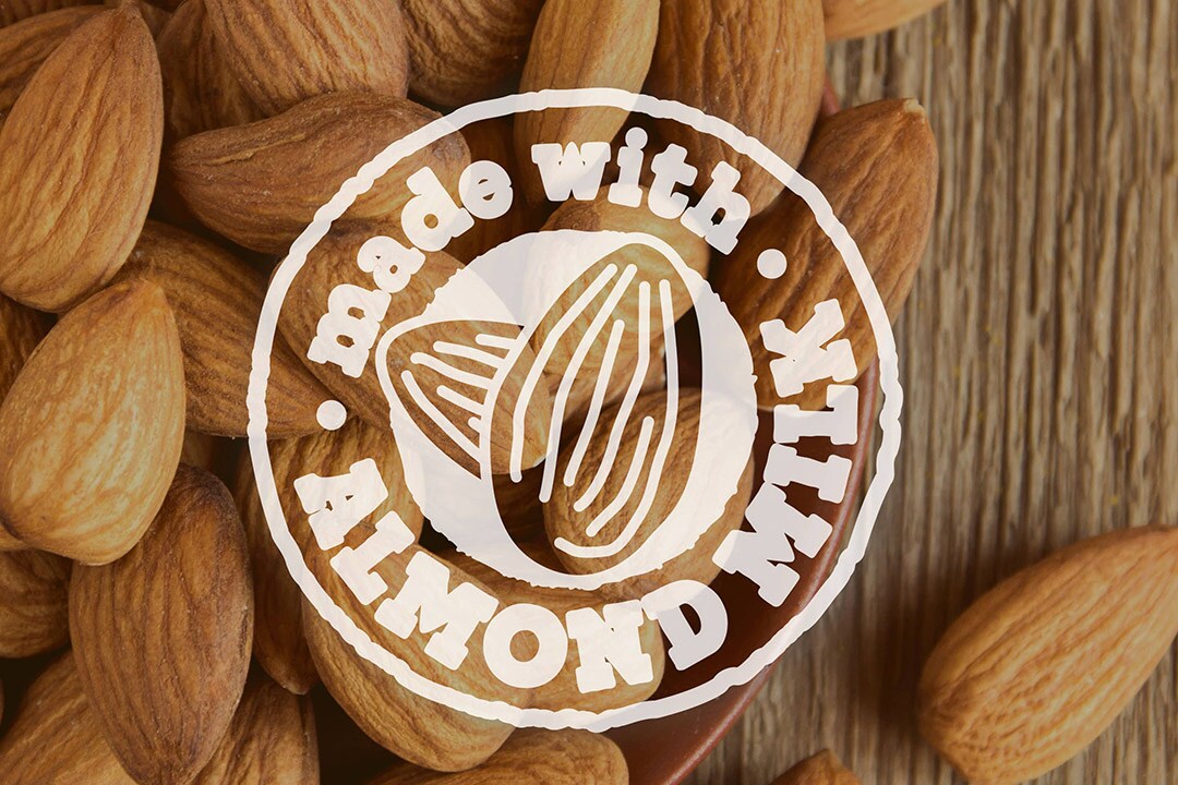 A table of almonds with Made with Almond Milk logo